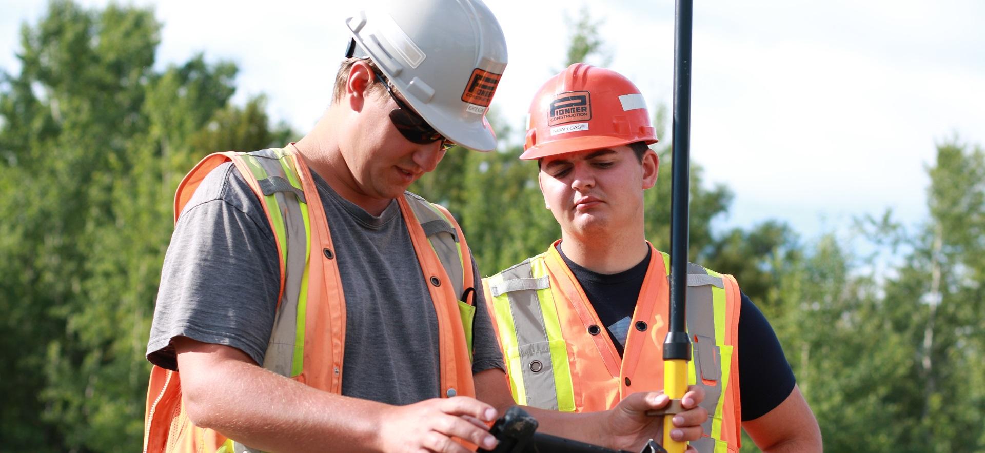 Civil Engineering students at a roadside construction site