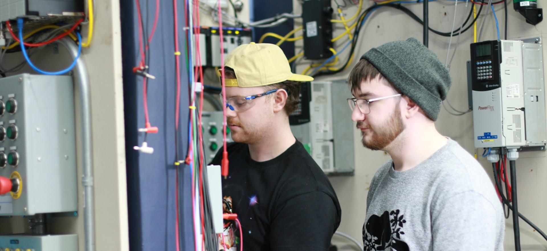 Electrical Engineering students working in lab