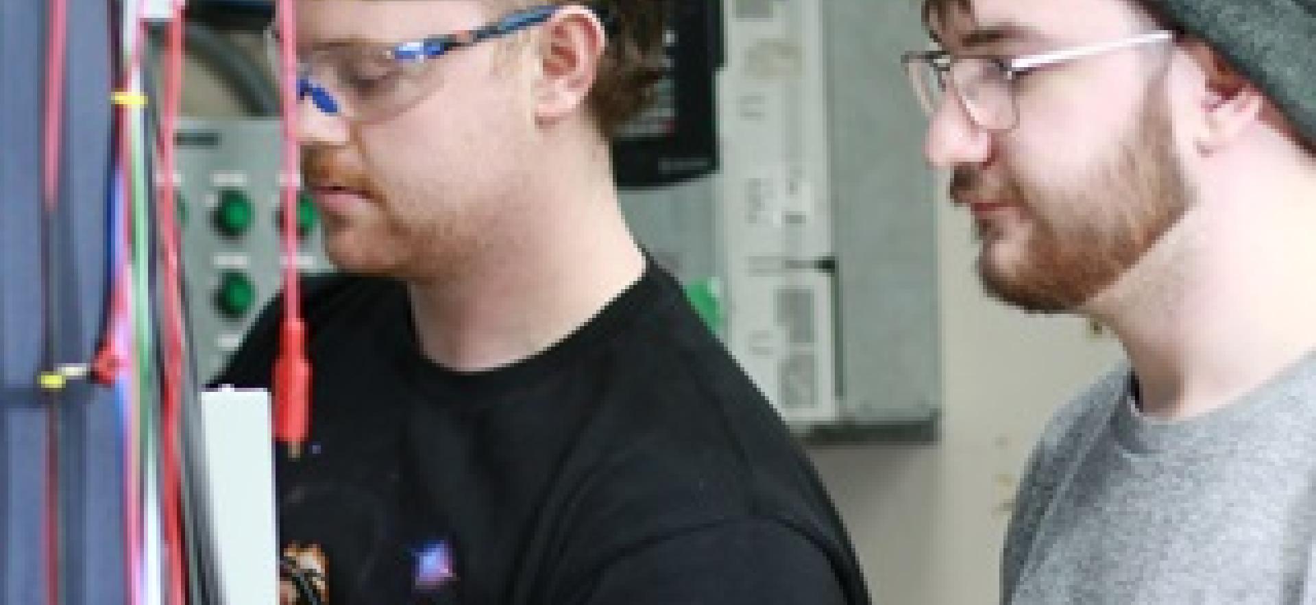 Electrical Engineering students working in lab