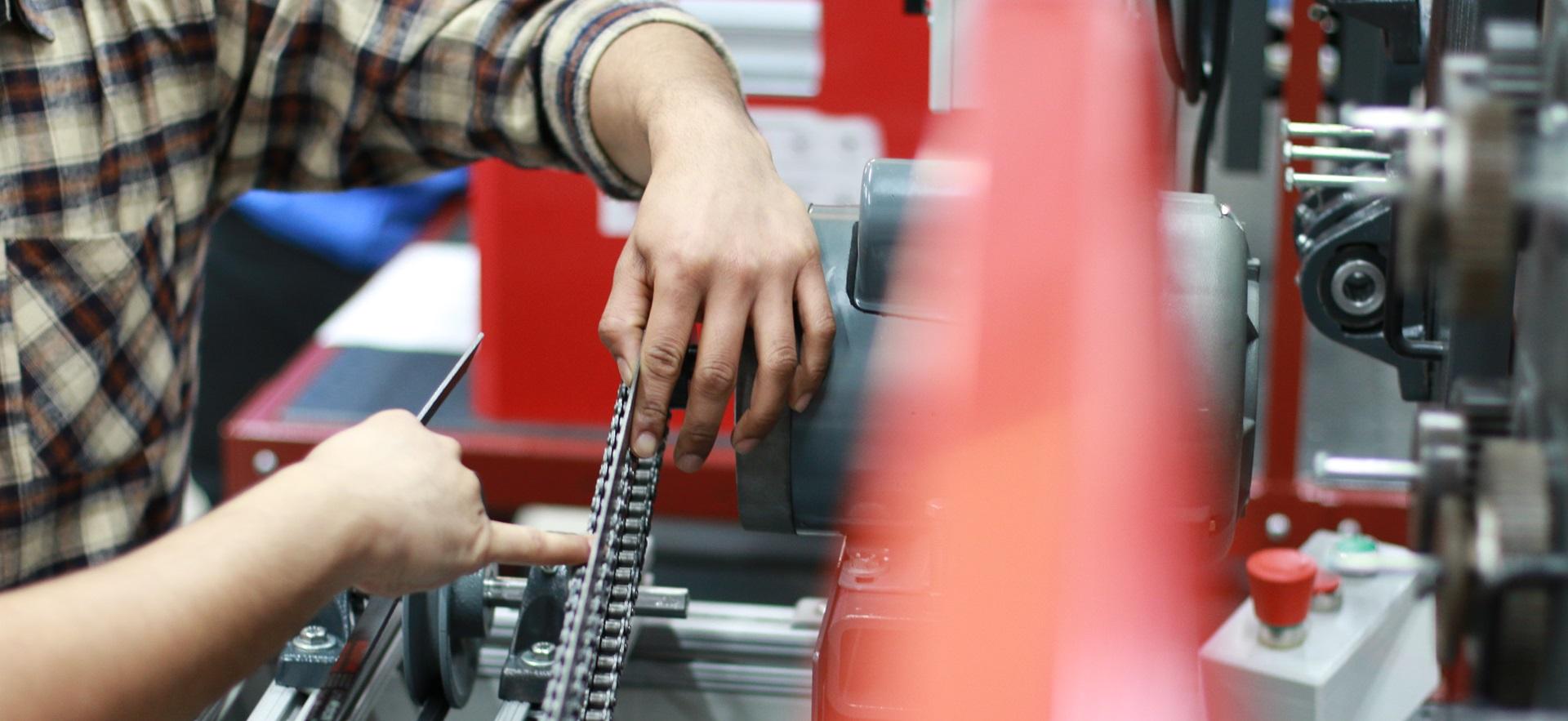 Mechanical Engineering student working with equipment in the lab
