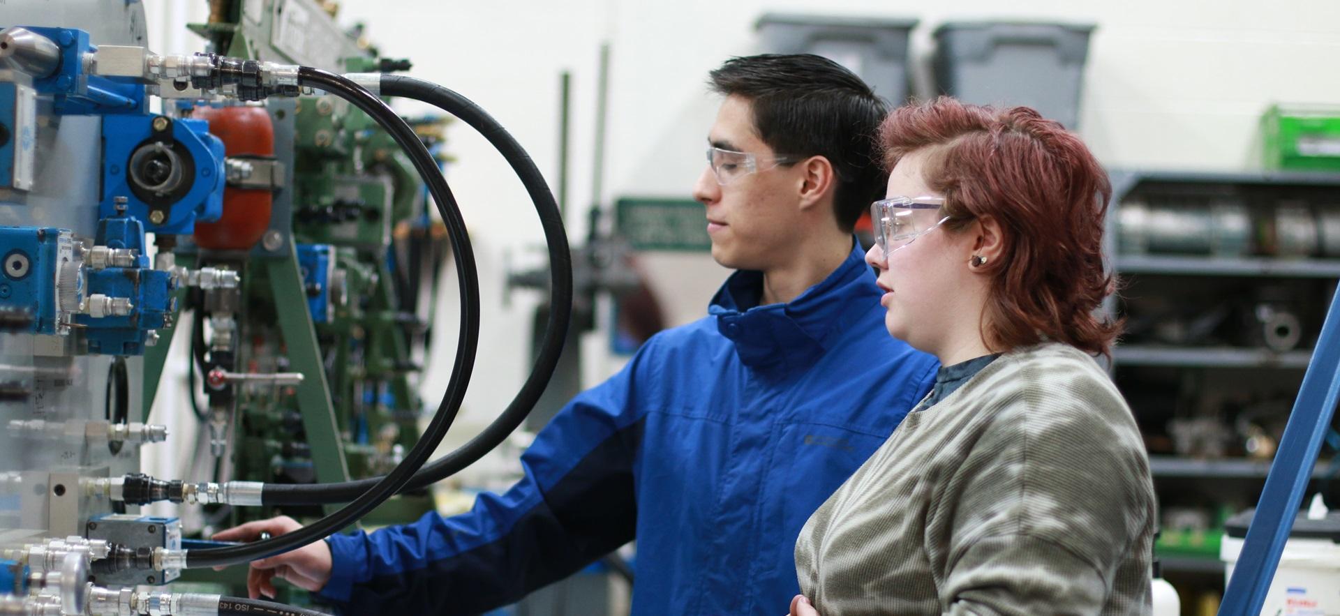 Mechanical Engineering student working with equipment in the lab