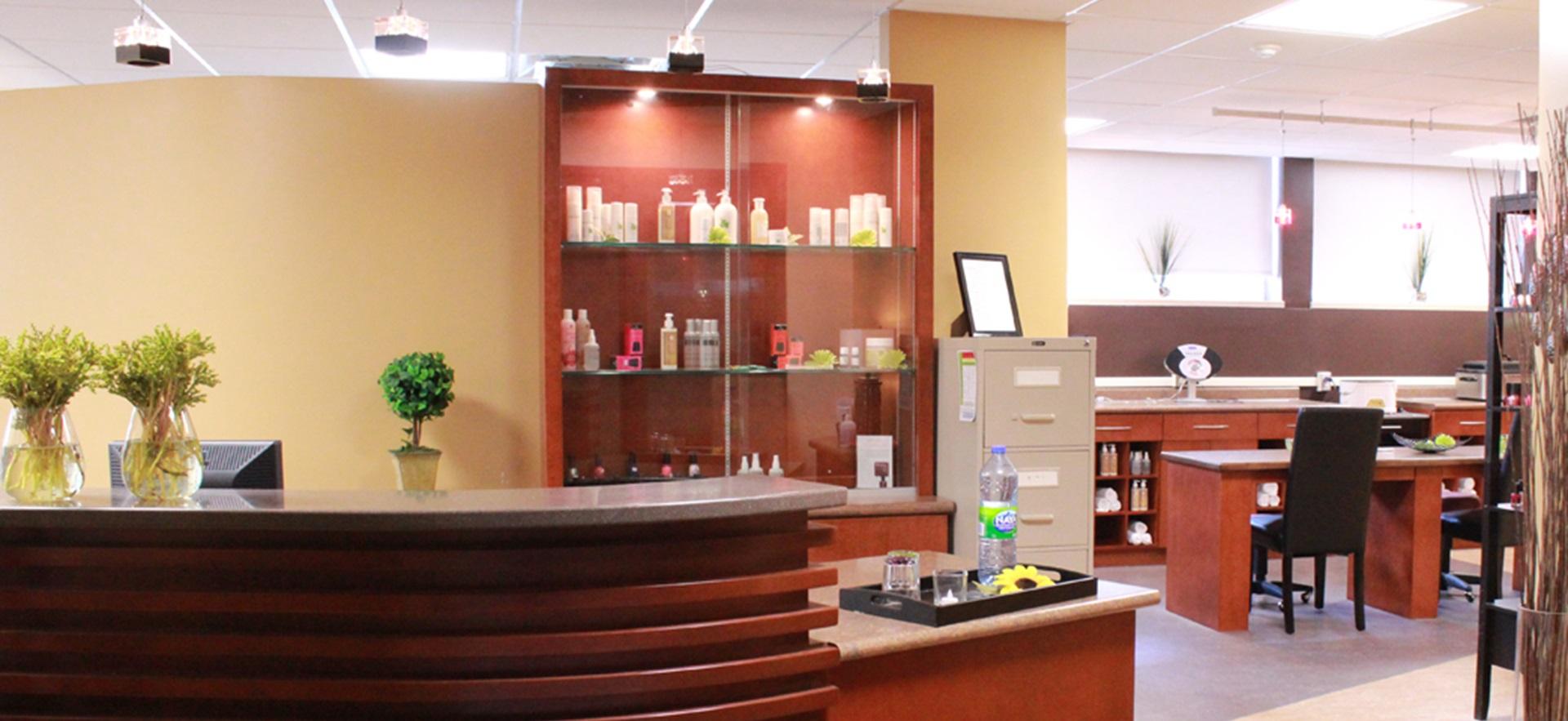 Spa front desk with side view of manicure stations