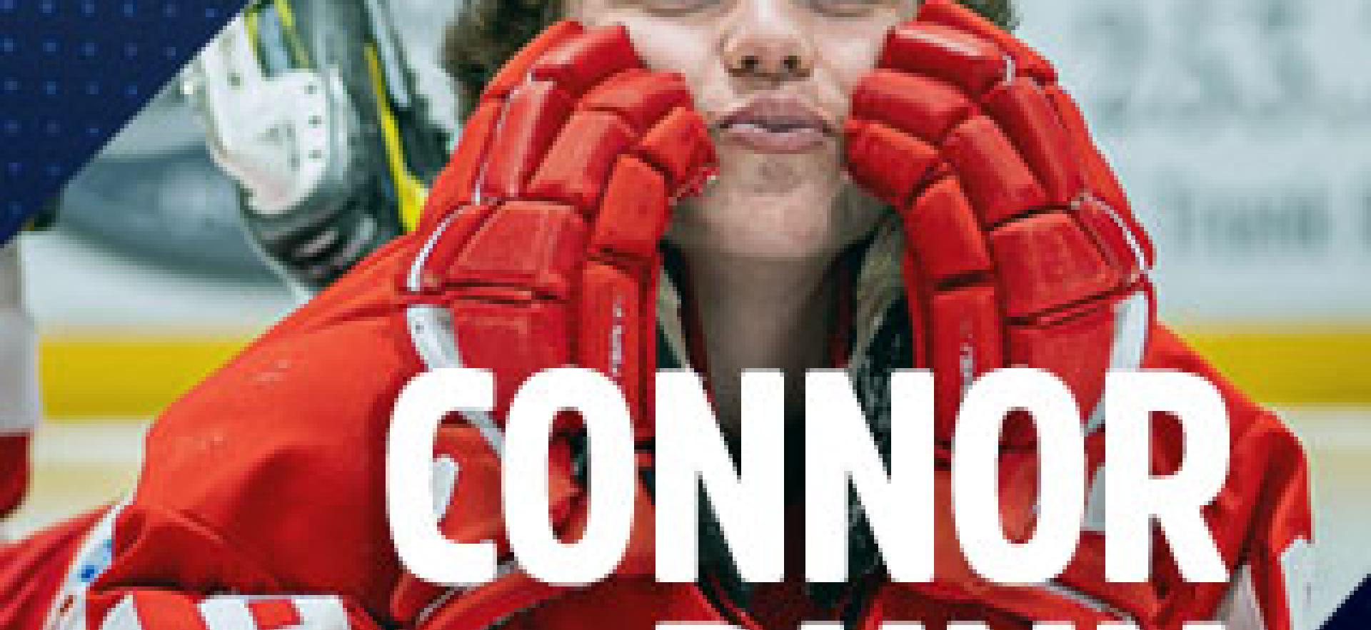 Connor Dunn Memorial Scholarship text overlayed on photo of Connor laying on ice