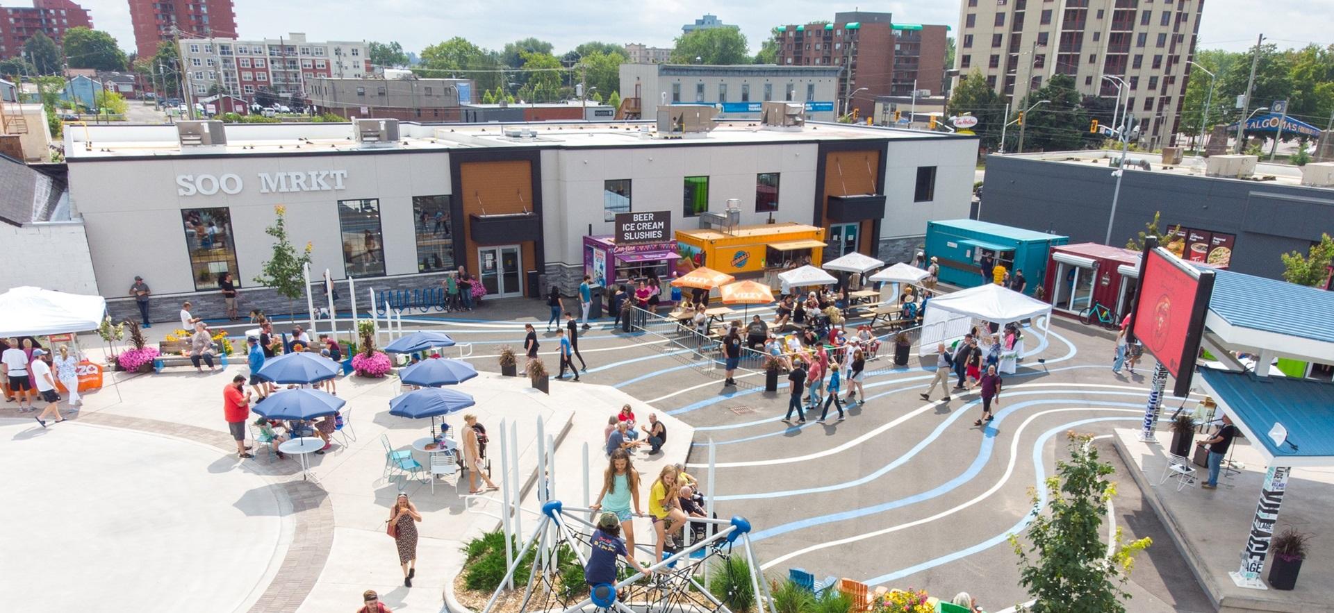 Downtown Plaza in summer during an event with people gathered