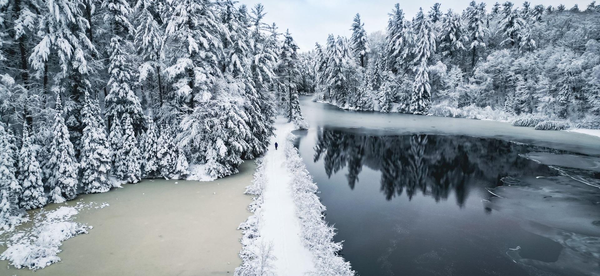 Winter aerial view of cross-country skiing trail after fresh heavy snowfall