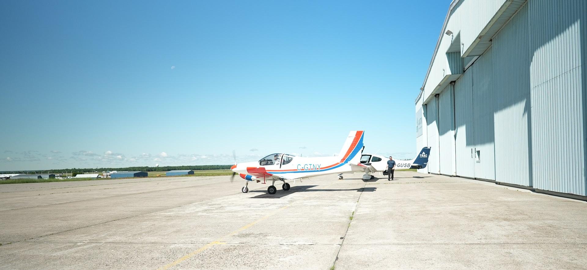 Plane outside at the hangar