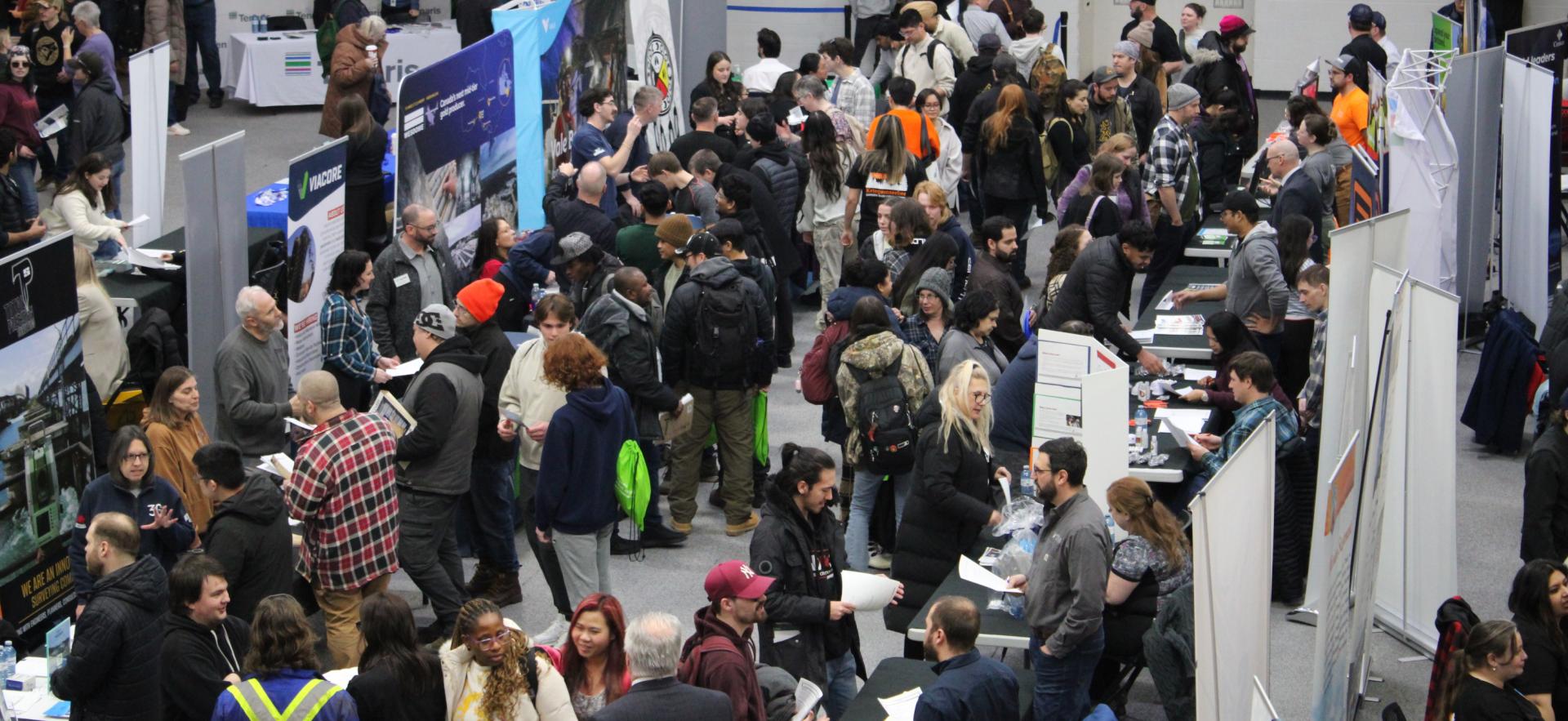 image of people visiting trade booths