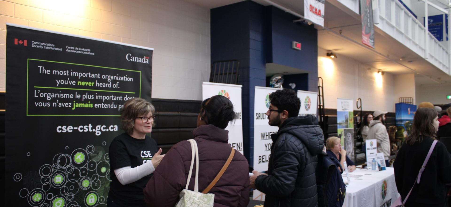 image of people visiting trade booths