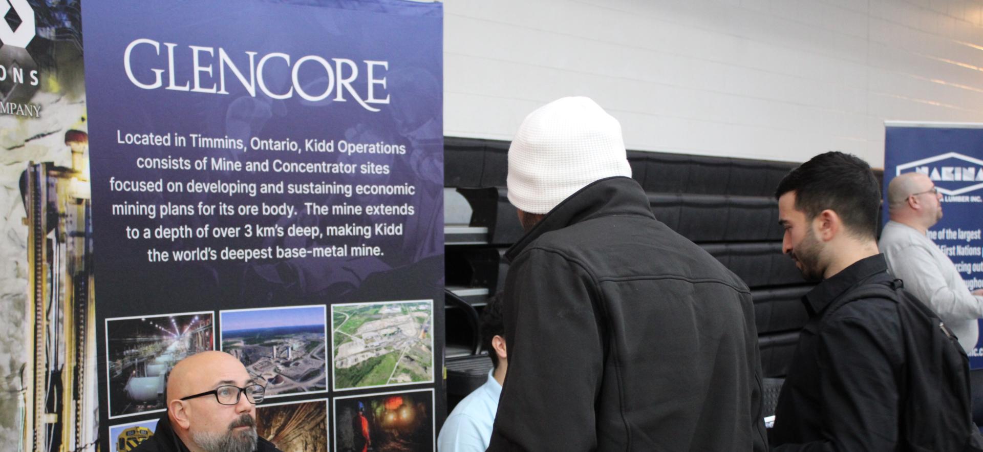image of people visiting trade booths