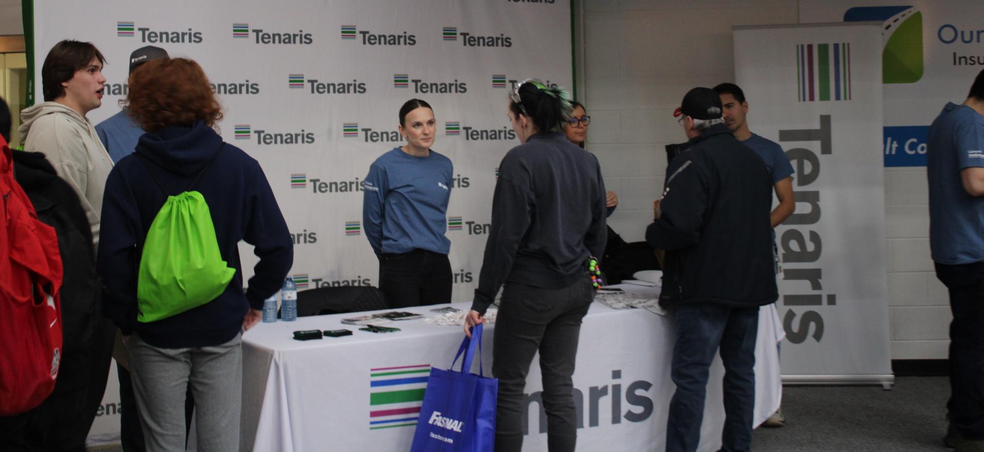 image of people visiting trade booths