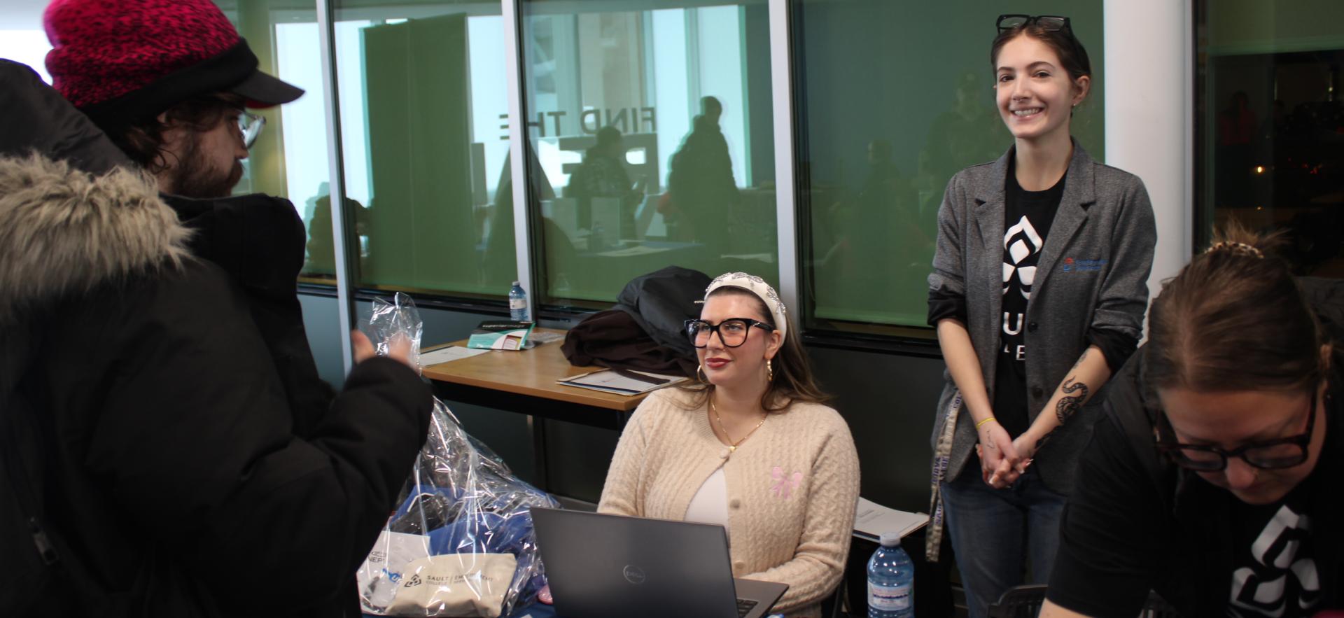 image of people visiting trade booths