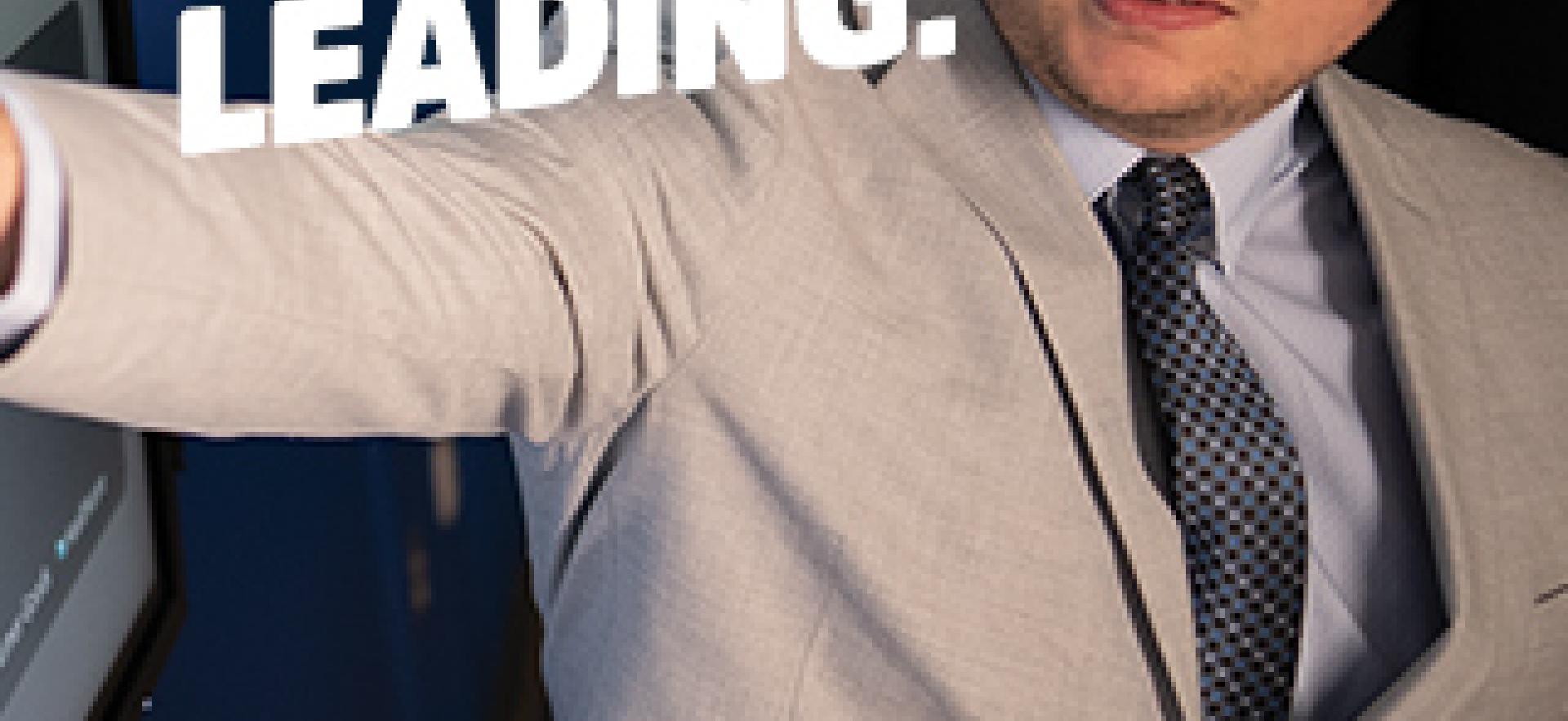 Business student pointing to accounting presentation