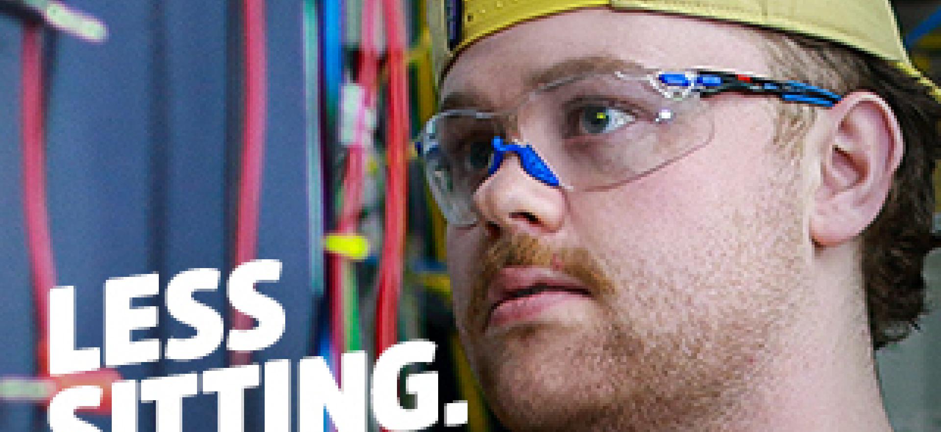 Electrical engineering student working in the automation systems lab