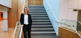 Image of Sherri Smith standing on stairs 