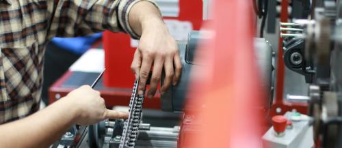 Mechanical Engineering student working with equipment in the lab